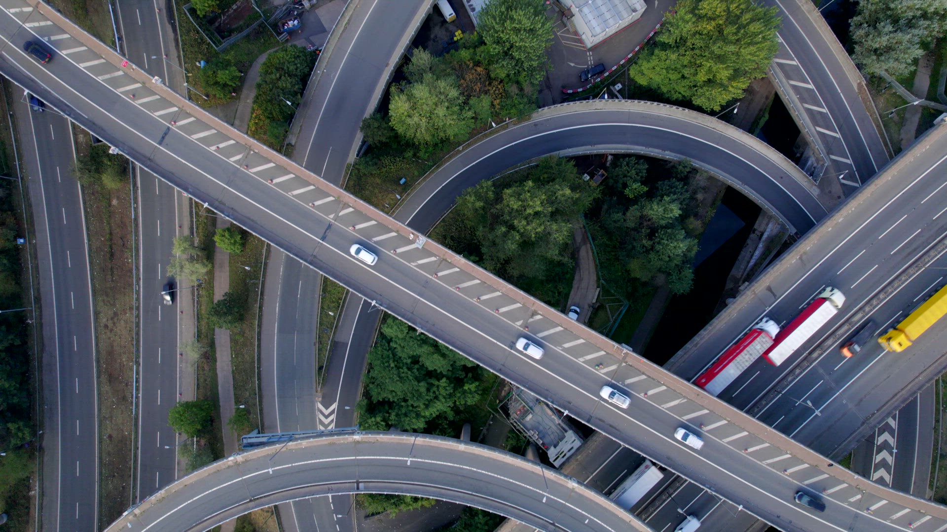 Vehicles Driving Navigating a Spaghetti Interchange Road System