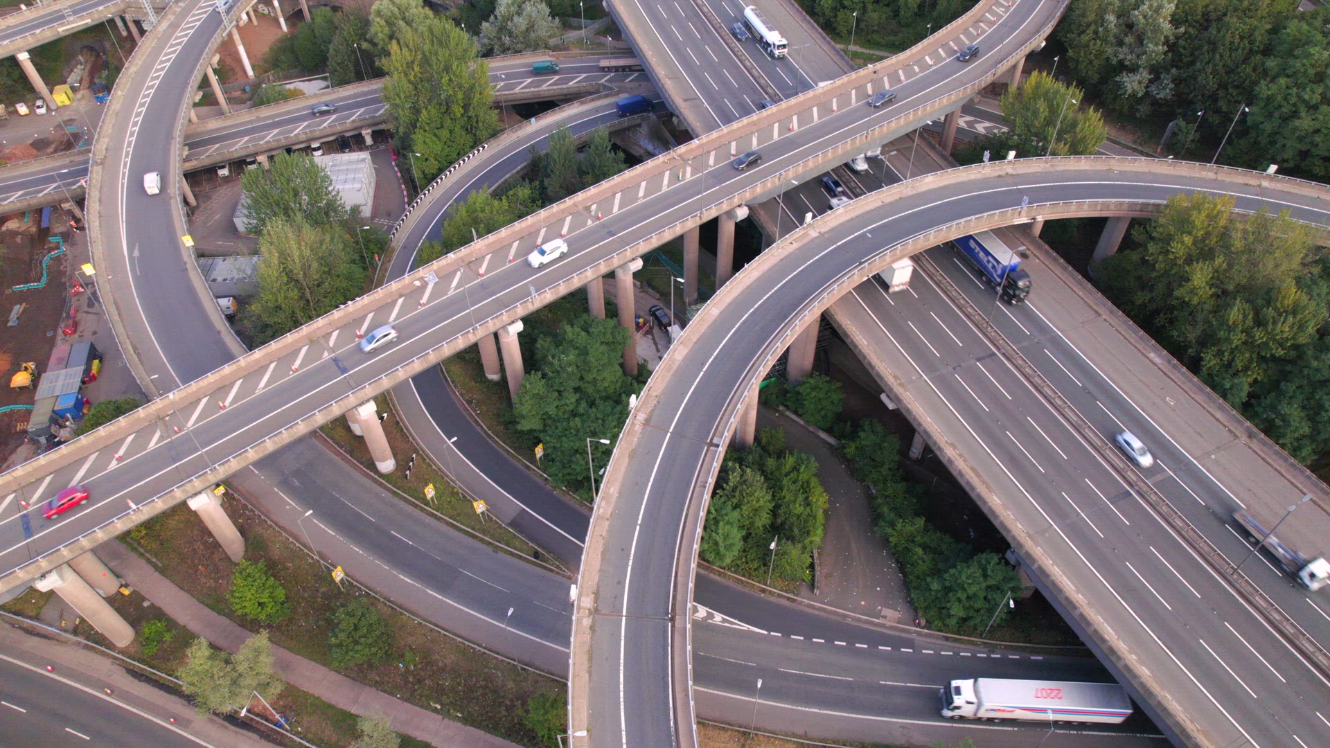 Vehicles Driving Navigating a Spaghetti Interchange Road System