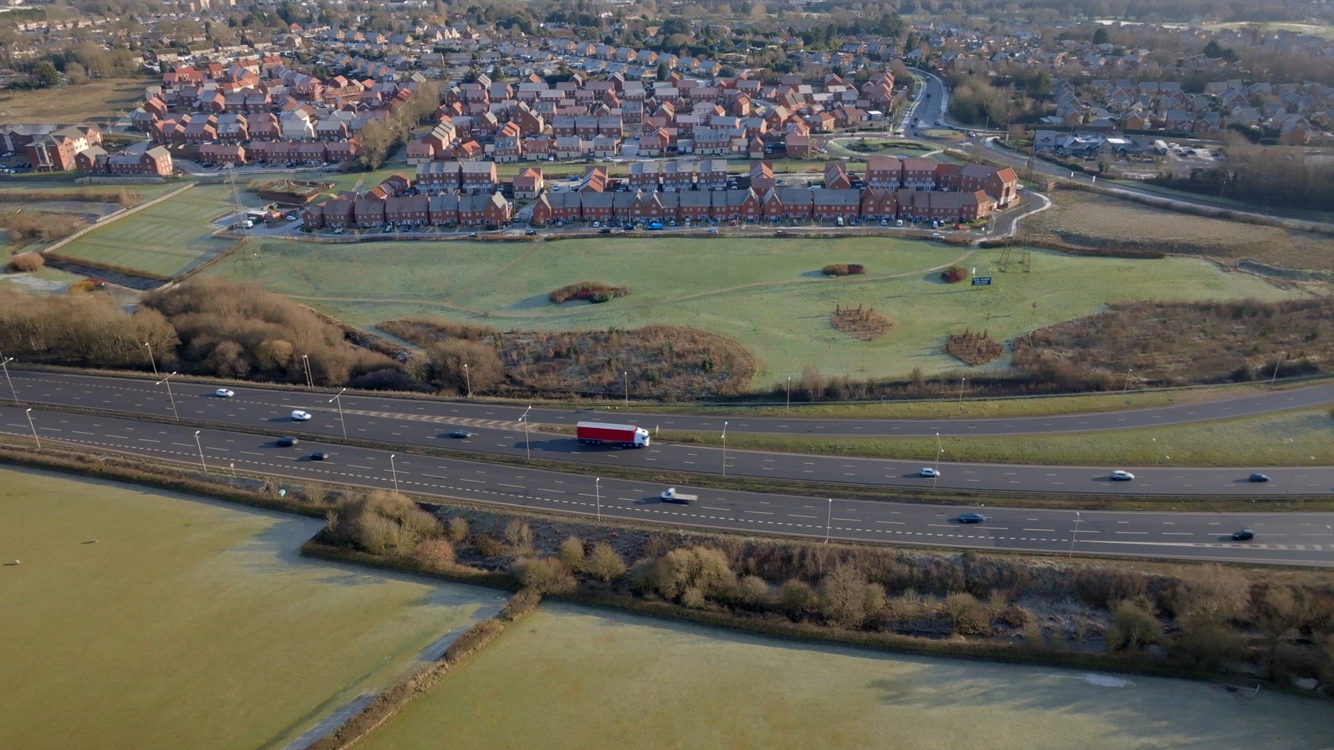 Lorries, Cars and Vehicles Driving on a UK Motorway Aerial View