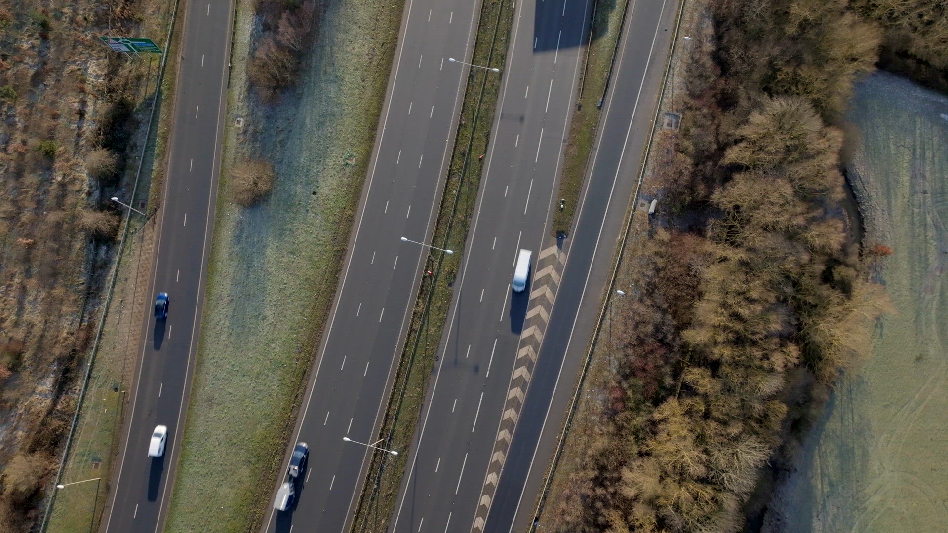 Lorries, Cars and Vehicles Driving on a UK Motorway Aerial View