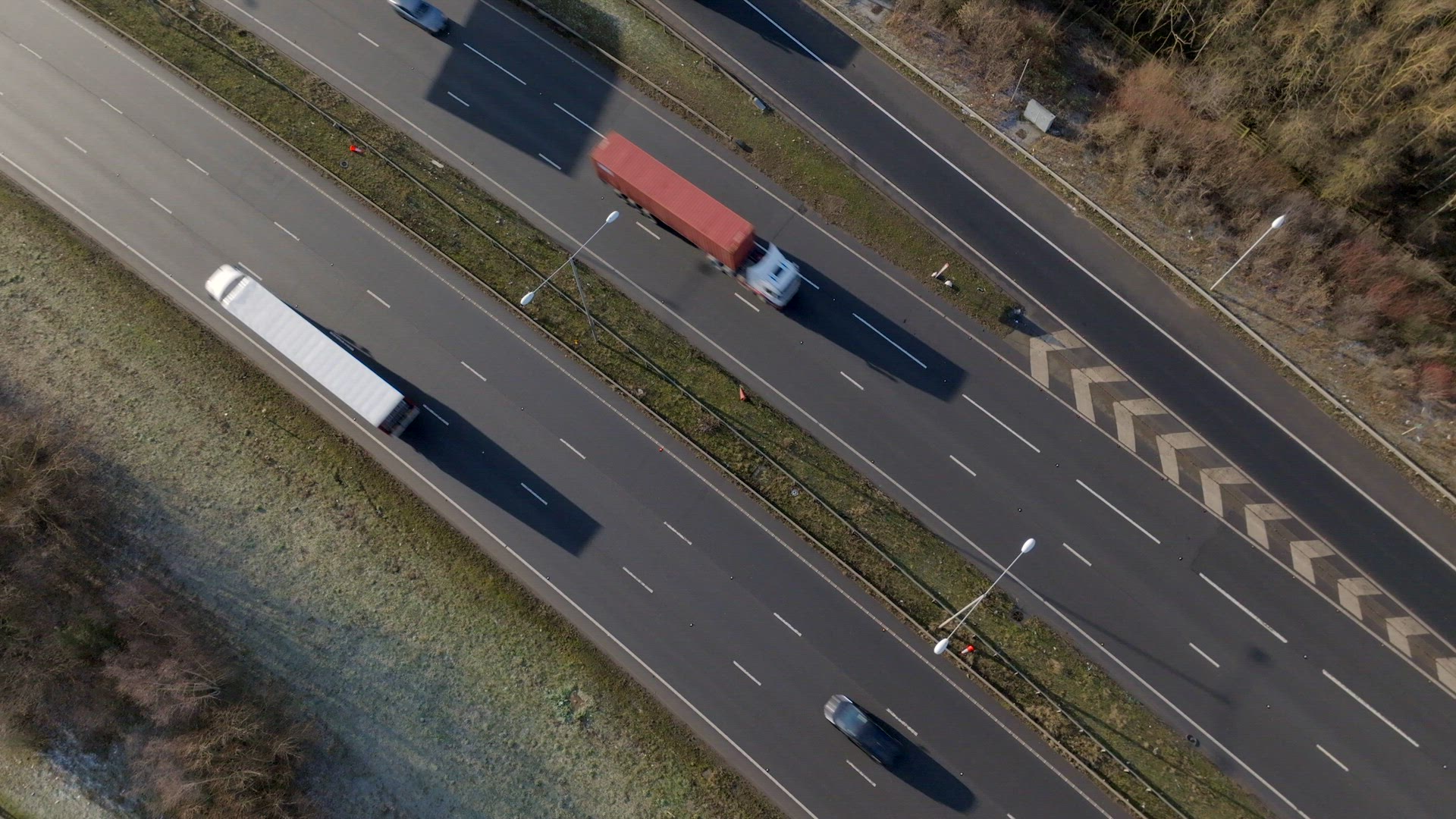 Lorries, Cars and Vehicles Driving on a UK Motorway Aerial View