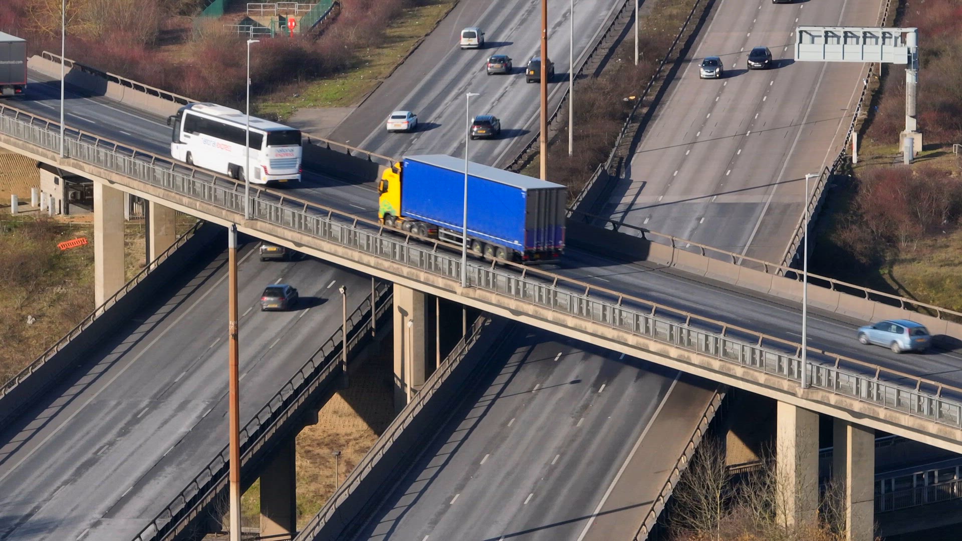 Vehicles Driving Along a Motorway Interchange in the UK
