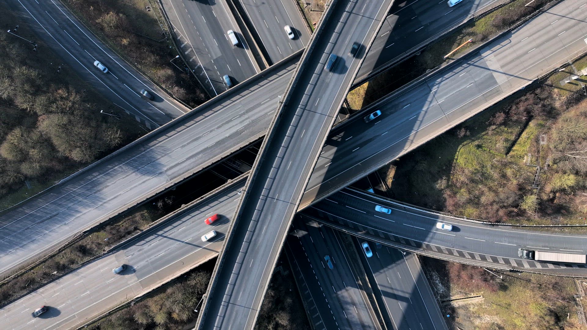 Rush Hour Vehicles Driving on a Highway Interchange Aerial View