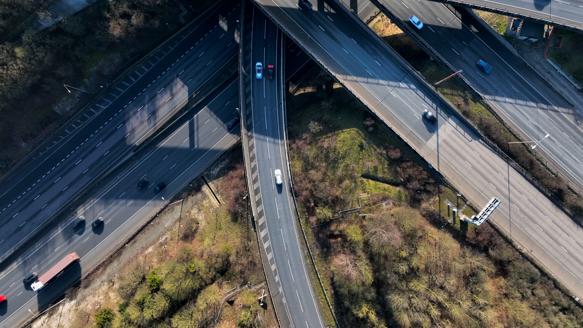 Rush Hour Vehicles Driving on a Motorway Interchange UK Aerial View