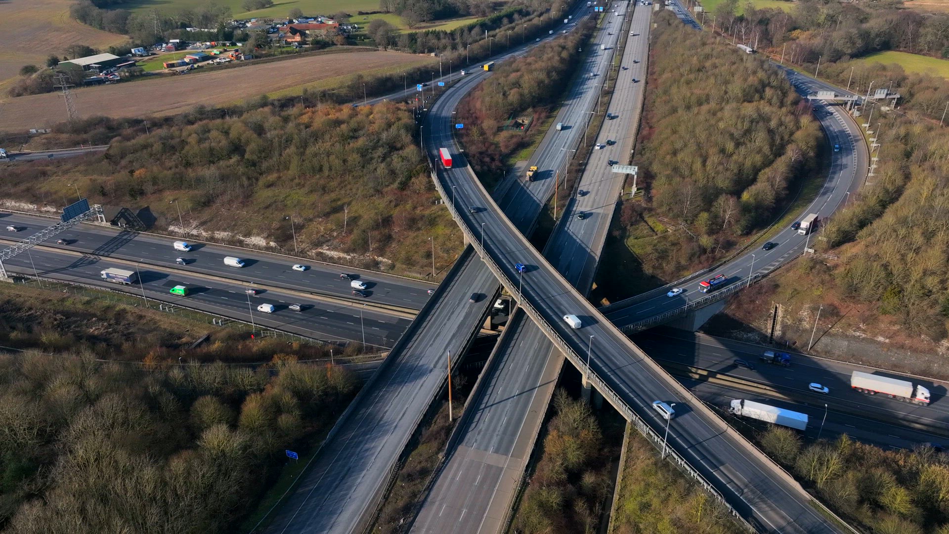 M1 and M25 UK Motorway Interchange Rush Hour Aerial View