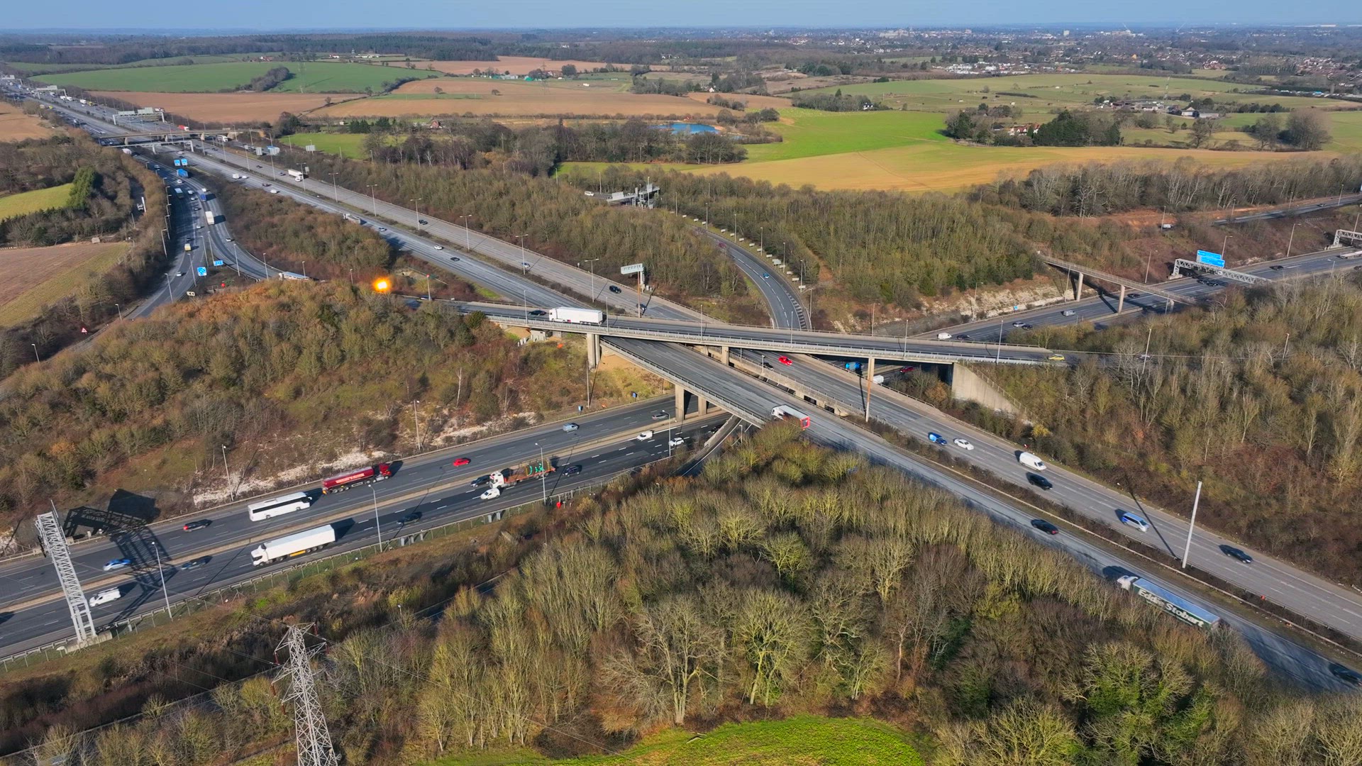 Rush Hour Vehicles Driving on a Motorway Interchange UK Aerial View