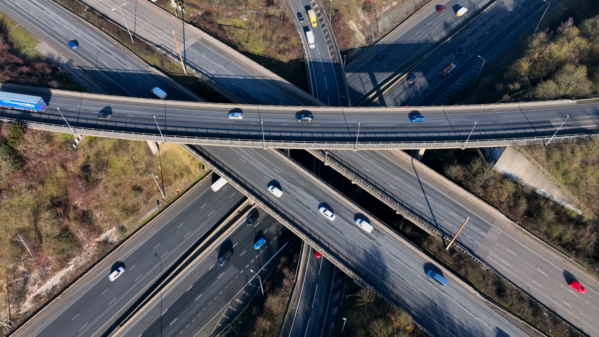 M1 and M25 UK Motorway Interchange Rush Hour Aerial View