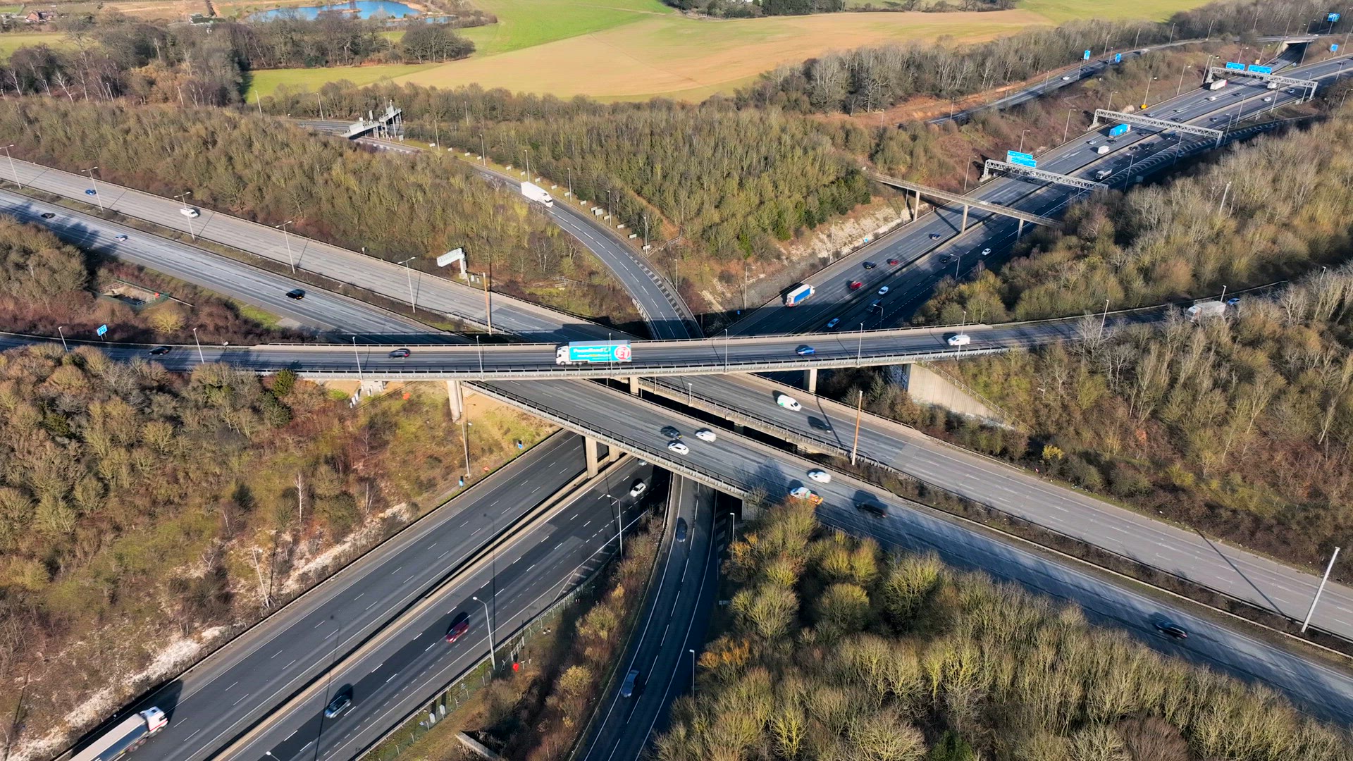 M1 and M25 UK Motorway Interchange Rush Hour Aerial View