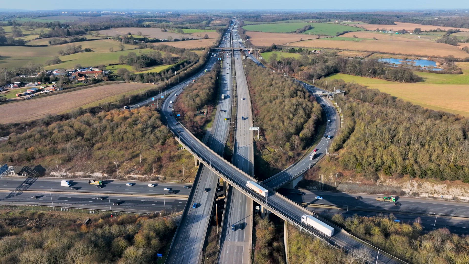 M1 and M25 UK Motorway Interchange Rush Hour Aerial View