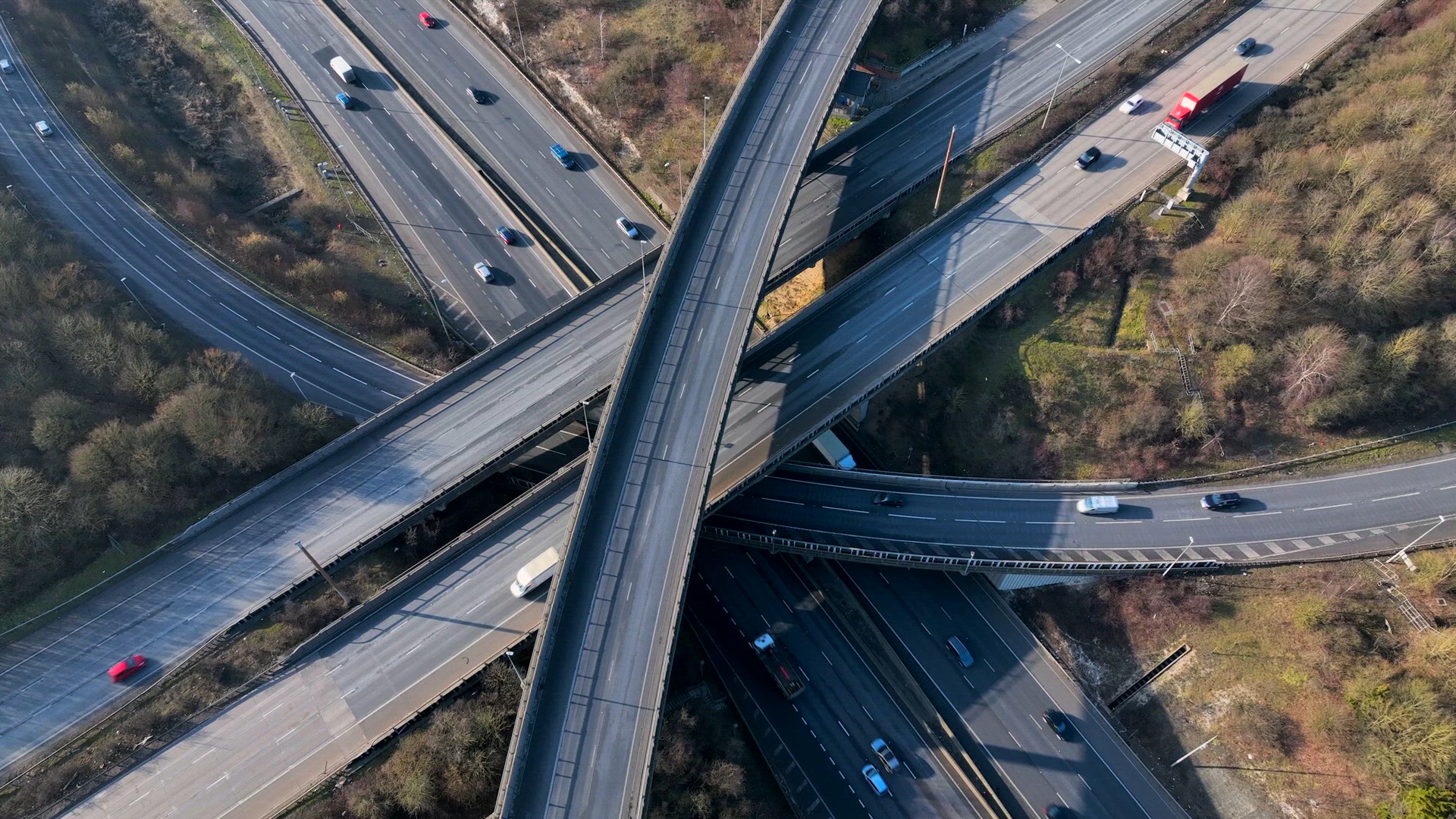 M1 and M25 UK Motorway Interchange Rush Hour Aerial View