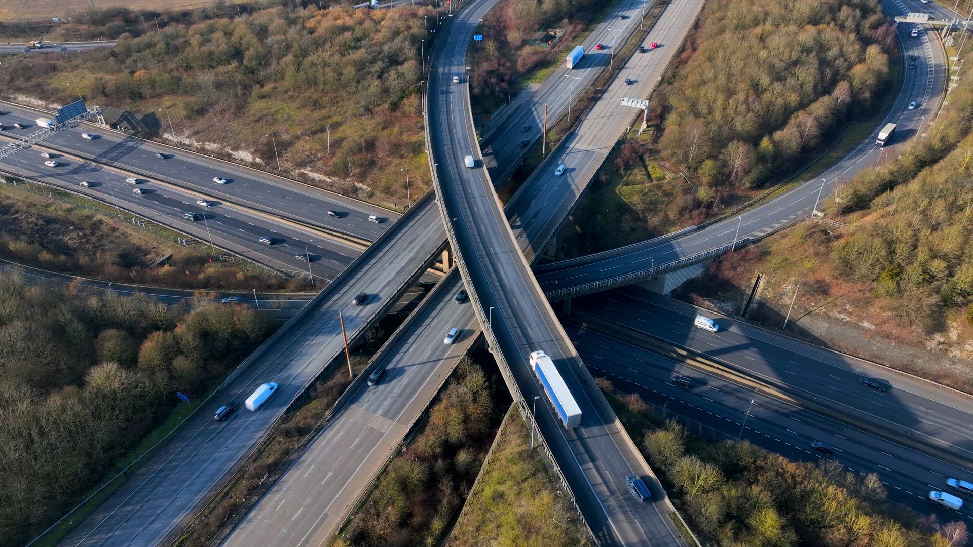 Rush Hour Vehicles Driving on a Motorway Interchange UK Aerial View