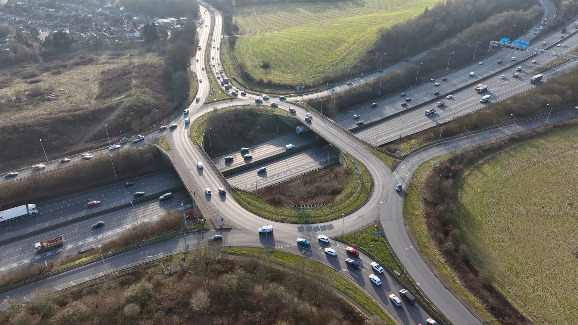 UK M25 Motorway Junction Aerial View at Rush Hour