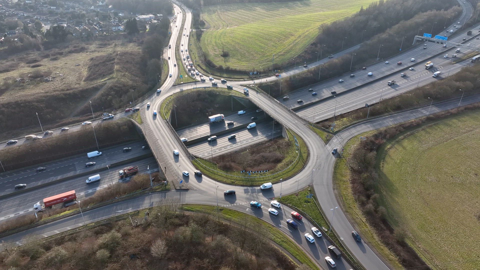 UK M25 Motorway Junction Aerial View at Rush Hour
