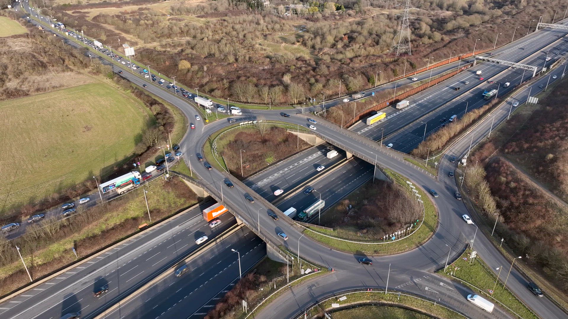 UK M25 Motorway Junction Aerial View at Rush Hour
