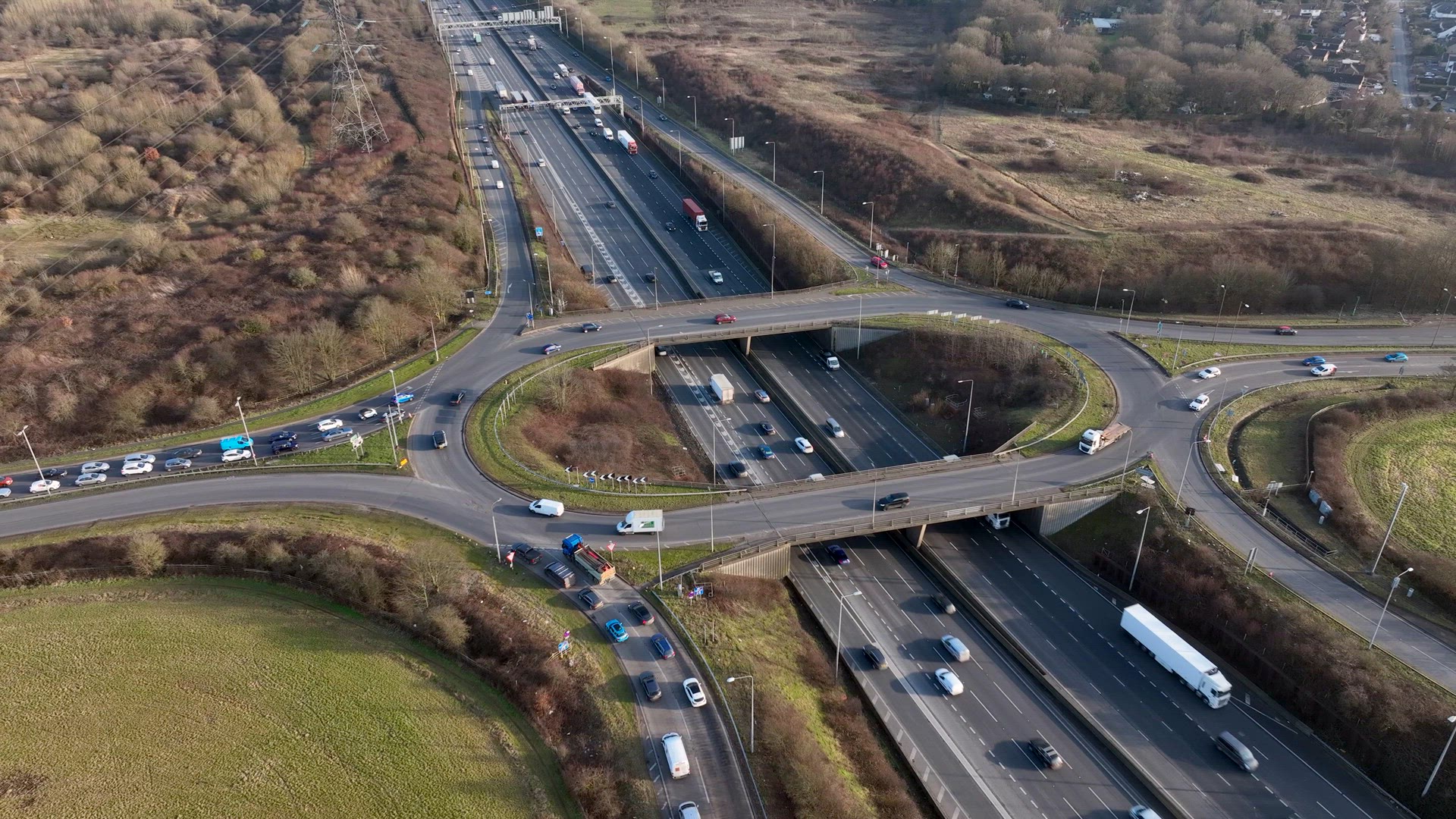 UK M25 Motorway Junction Aerial View at Rush Hour
