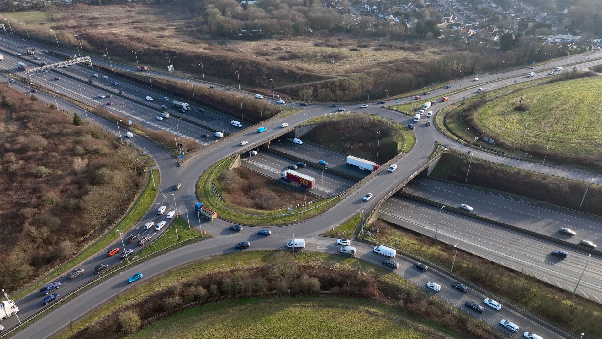Roundabout Motorway Junction Aerial View at Rush Hour