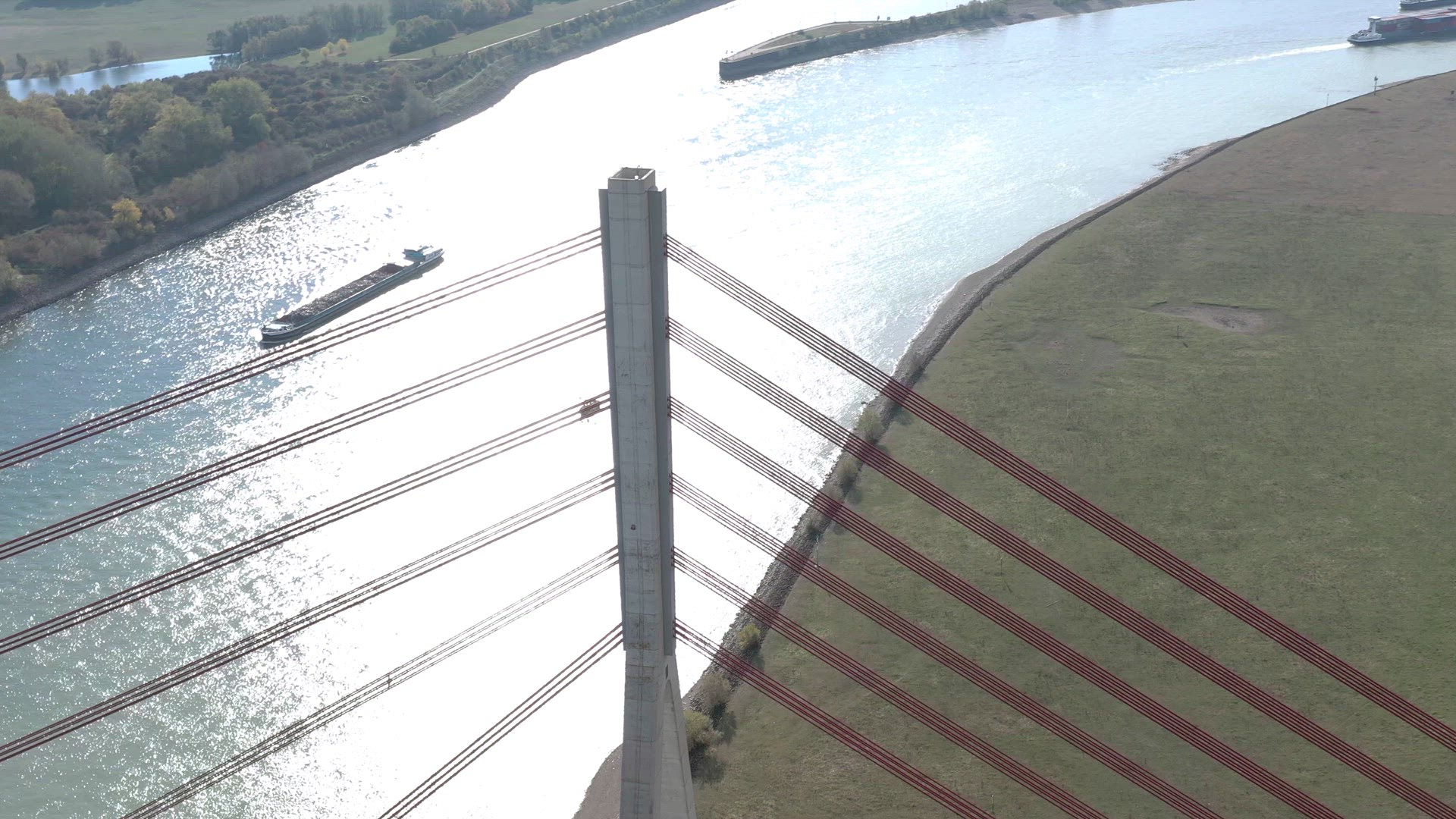 Aerial View of a Cable Stayed Suspension Bridge Crossing a River