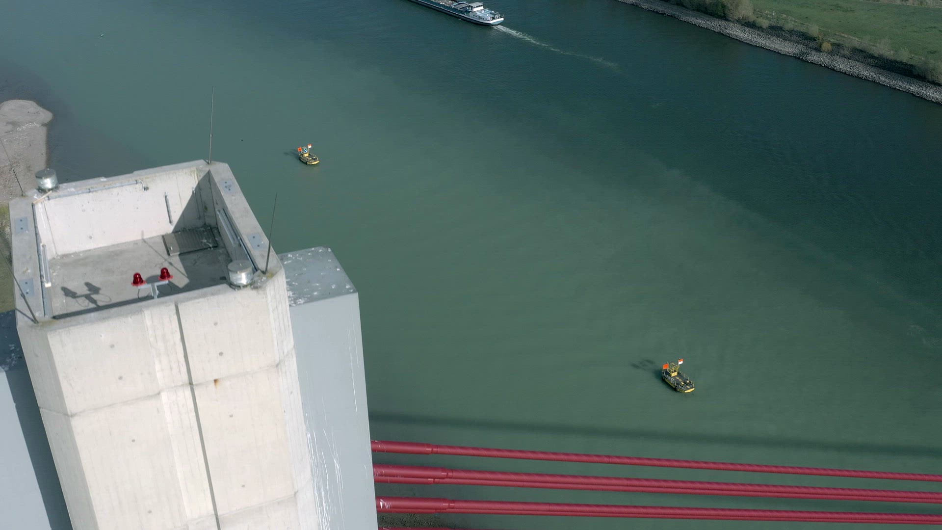Aerial View of a Cable Stayed Suspension Bridge Crossing a River