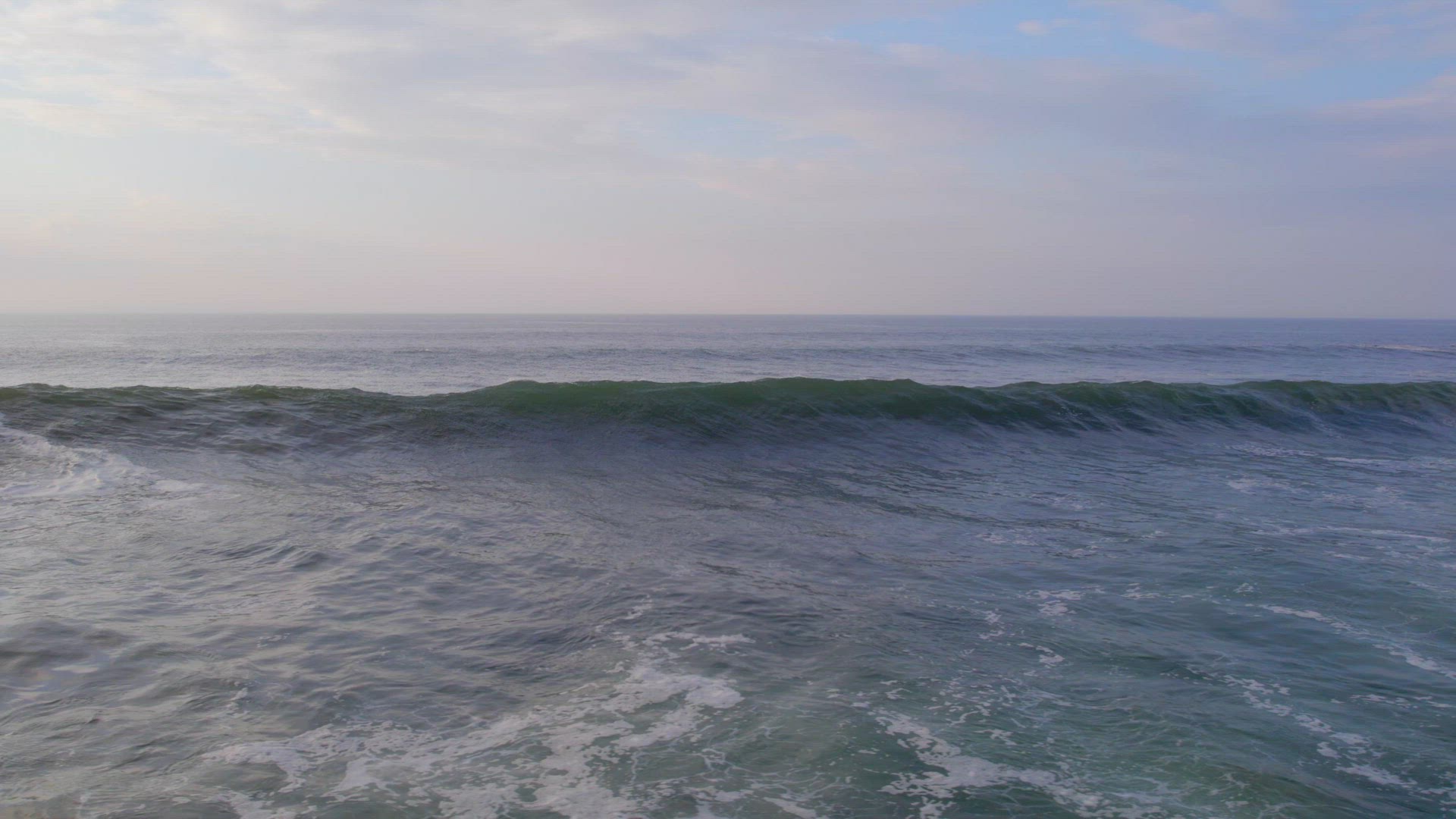Ocean Waves Gaining Height and Power as they Approach the Shore