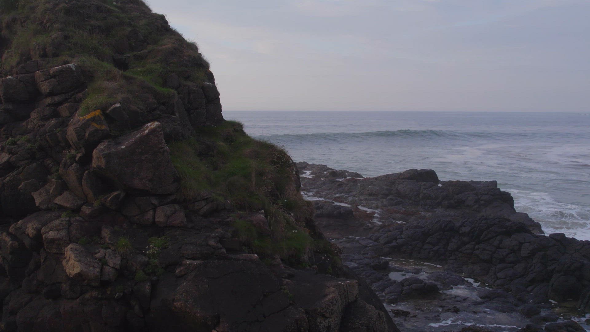 Ocean Waves Crashing Against the Rocky Shores of the Coastline