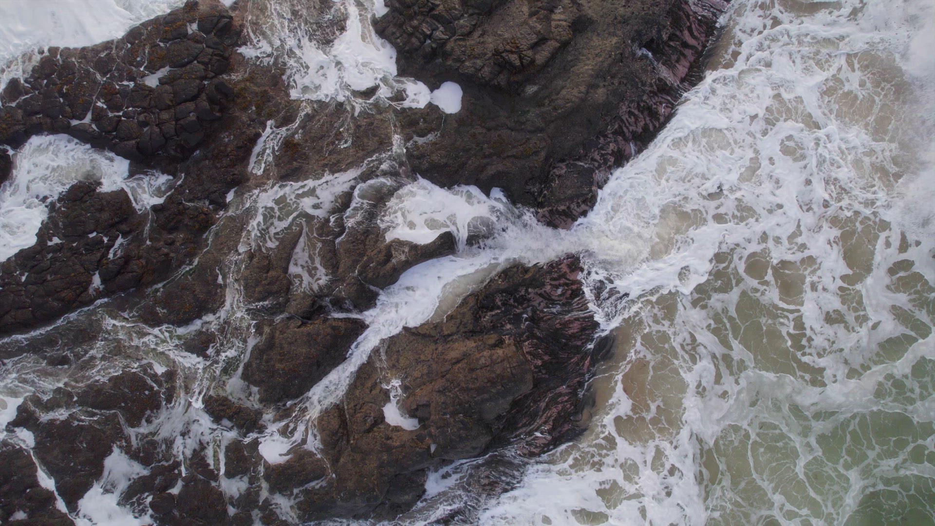 Ocean Waves Crashing Against the Rocky Shores