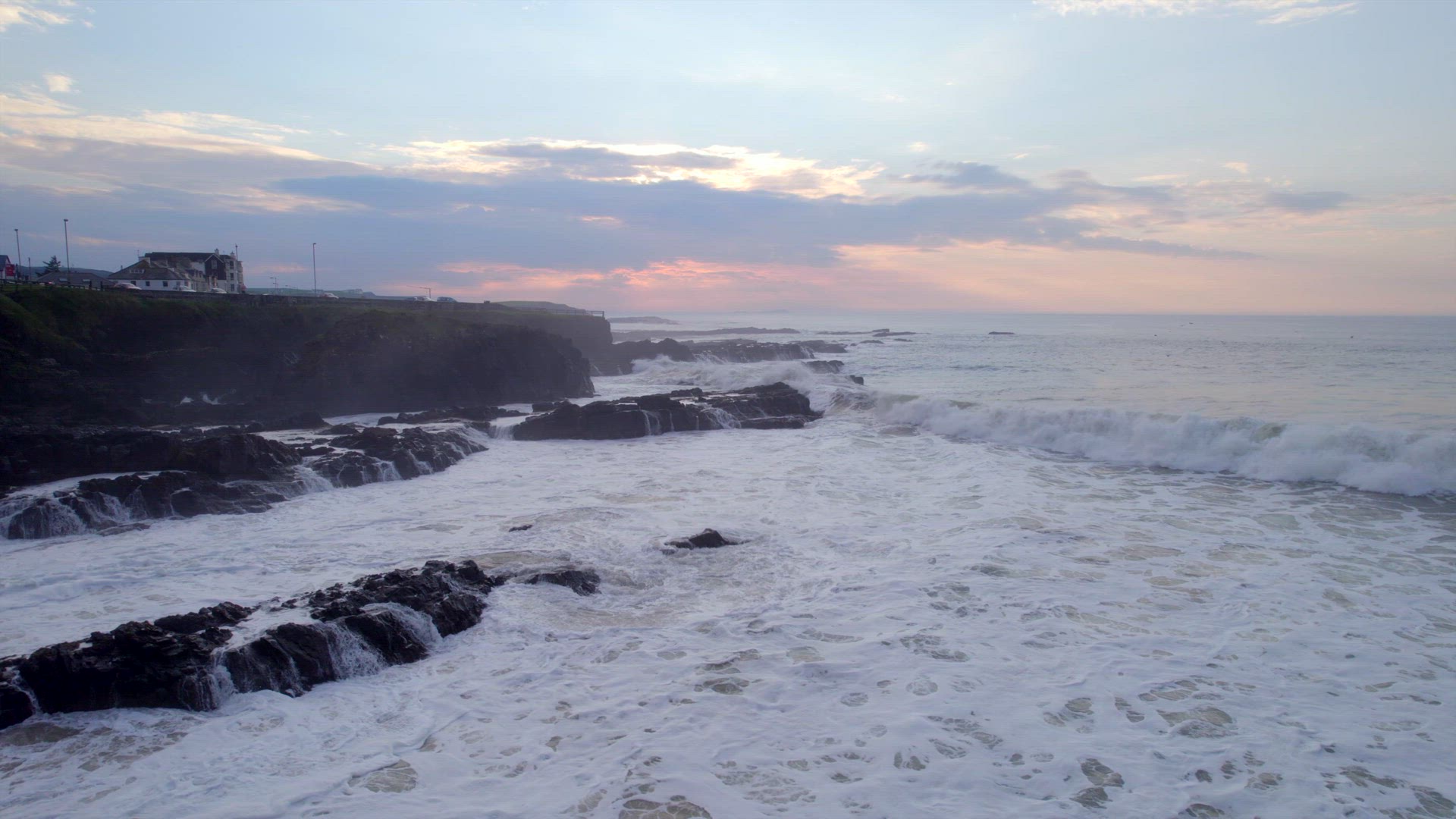 Ocean Waves Crashing Against the Rocky Shores of the Coastline