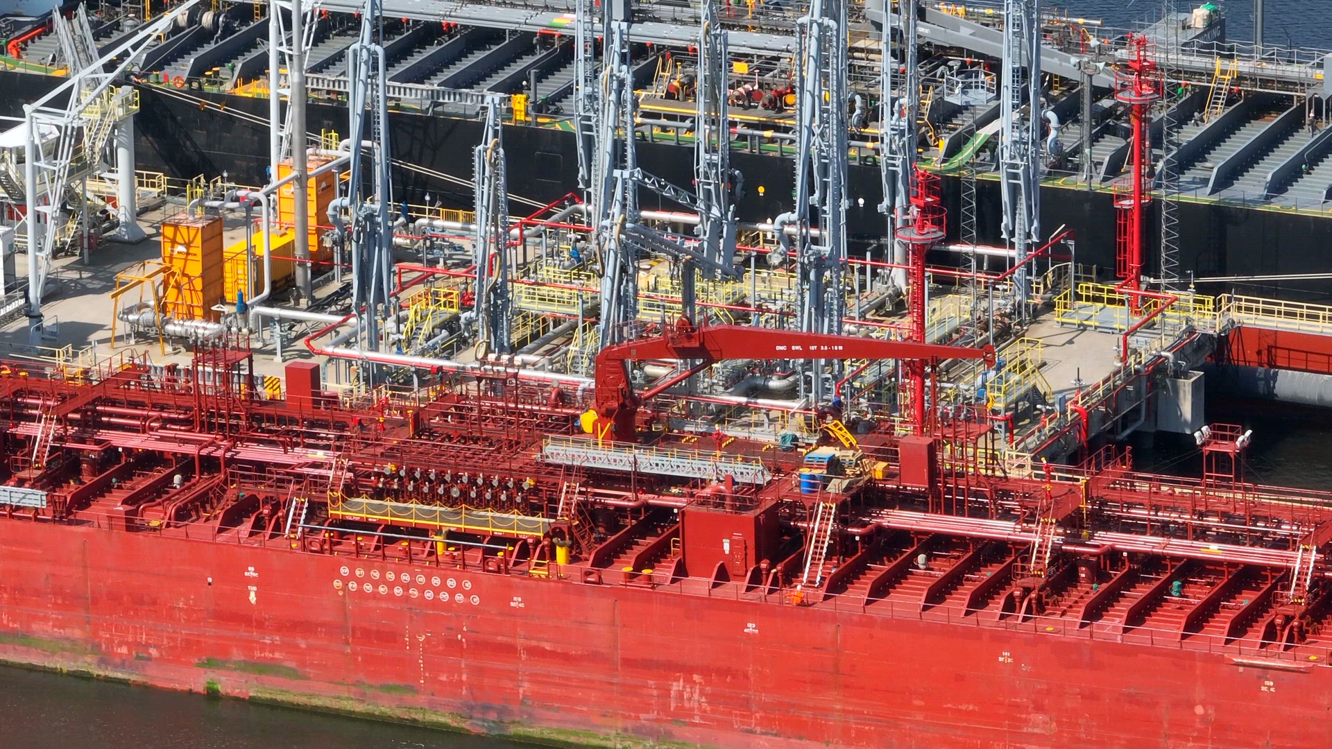 Oil Tanker Ships Unloading Petrochemicals at a Port Depot