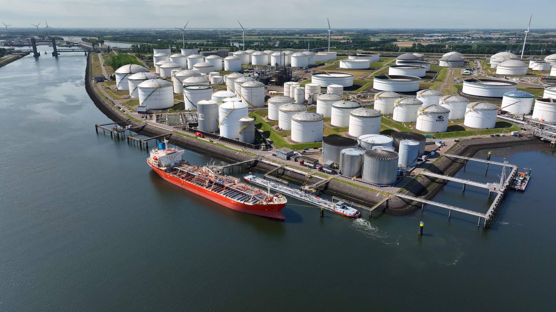Crude Oil Liquid Cargo Transporter Ship Unloading Petrochemicals to a Fuel Depot