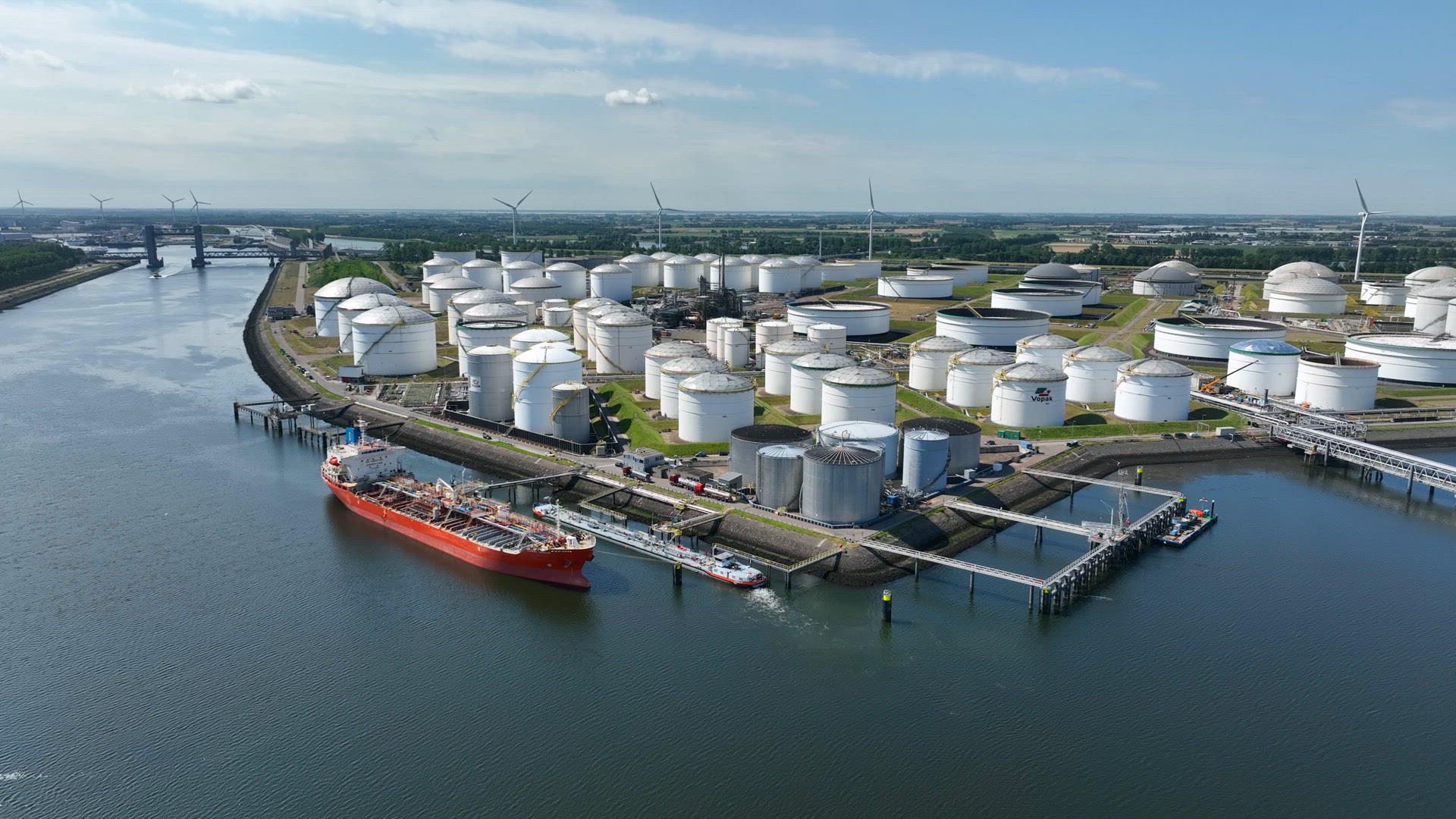 Crude Oil Liquid Cargo Transporter Ship Unloading Petrochemicals to a Fuel Depot