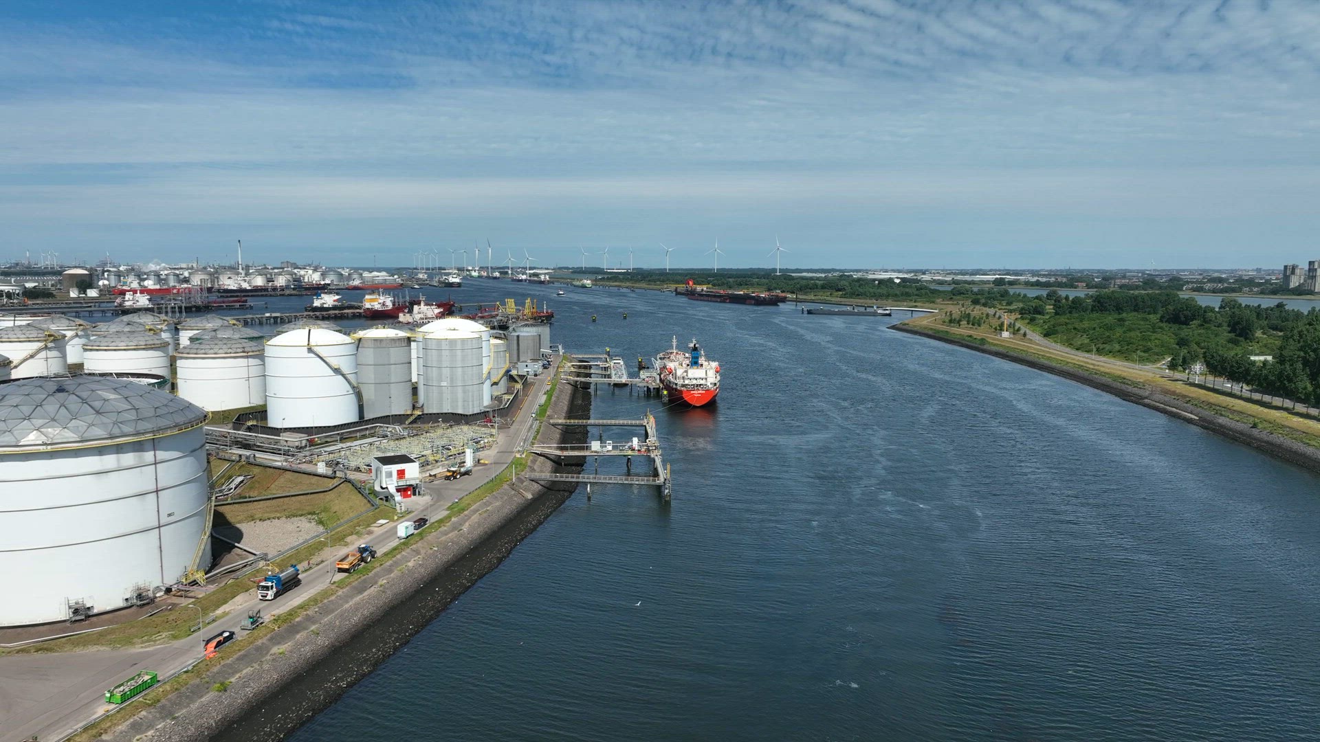 Crude Oil Tanker Ships Unloading Petrochemicals to a Shore Fuel Depot