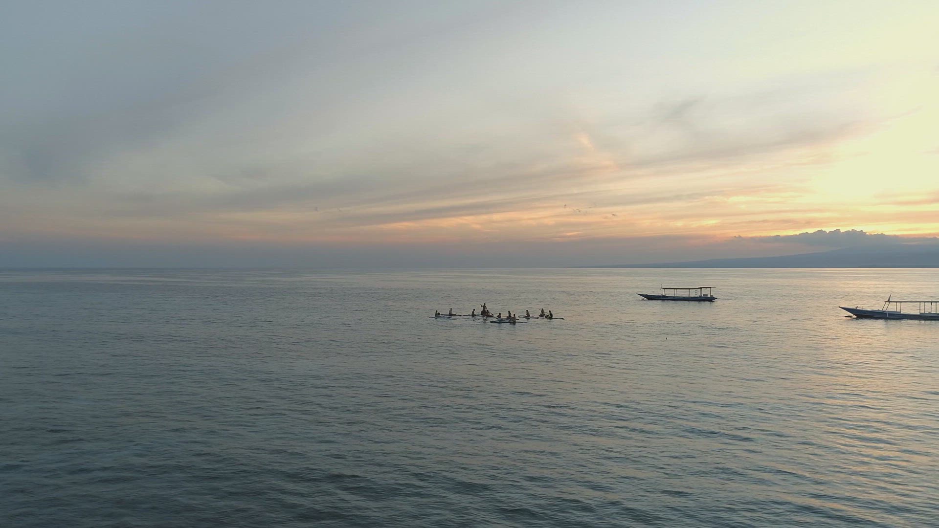 Sunrise Yoga Class on Stand Up Paddle Boards in the Calm Ocean