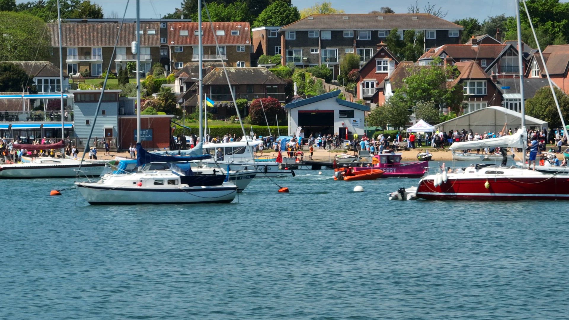 Yachts, Speedboats and Vessels on a River in the Summer