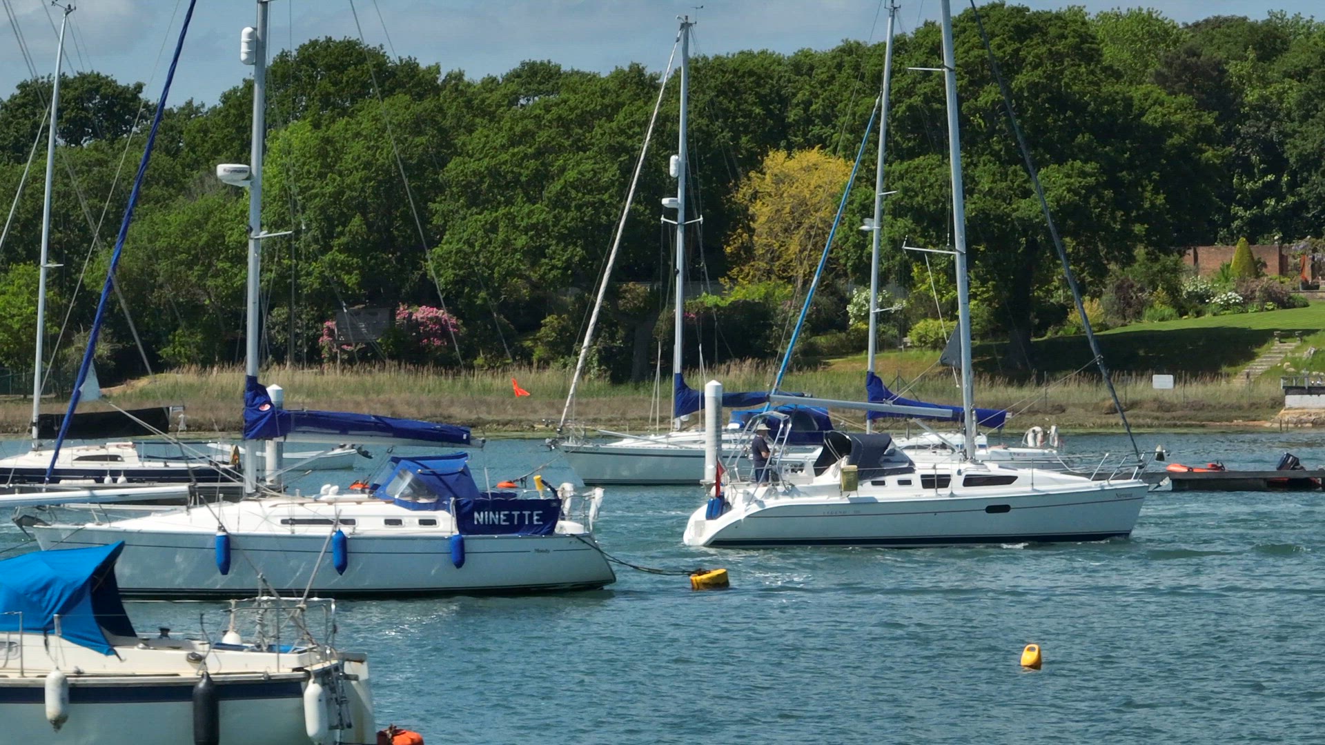 Yachts, Boats and Vessels on a River in the Summer