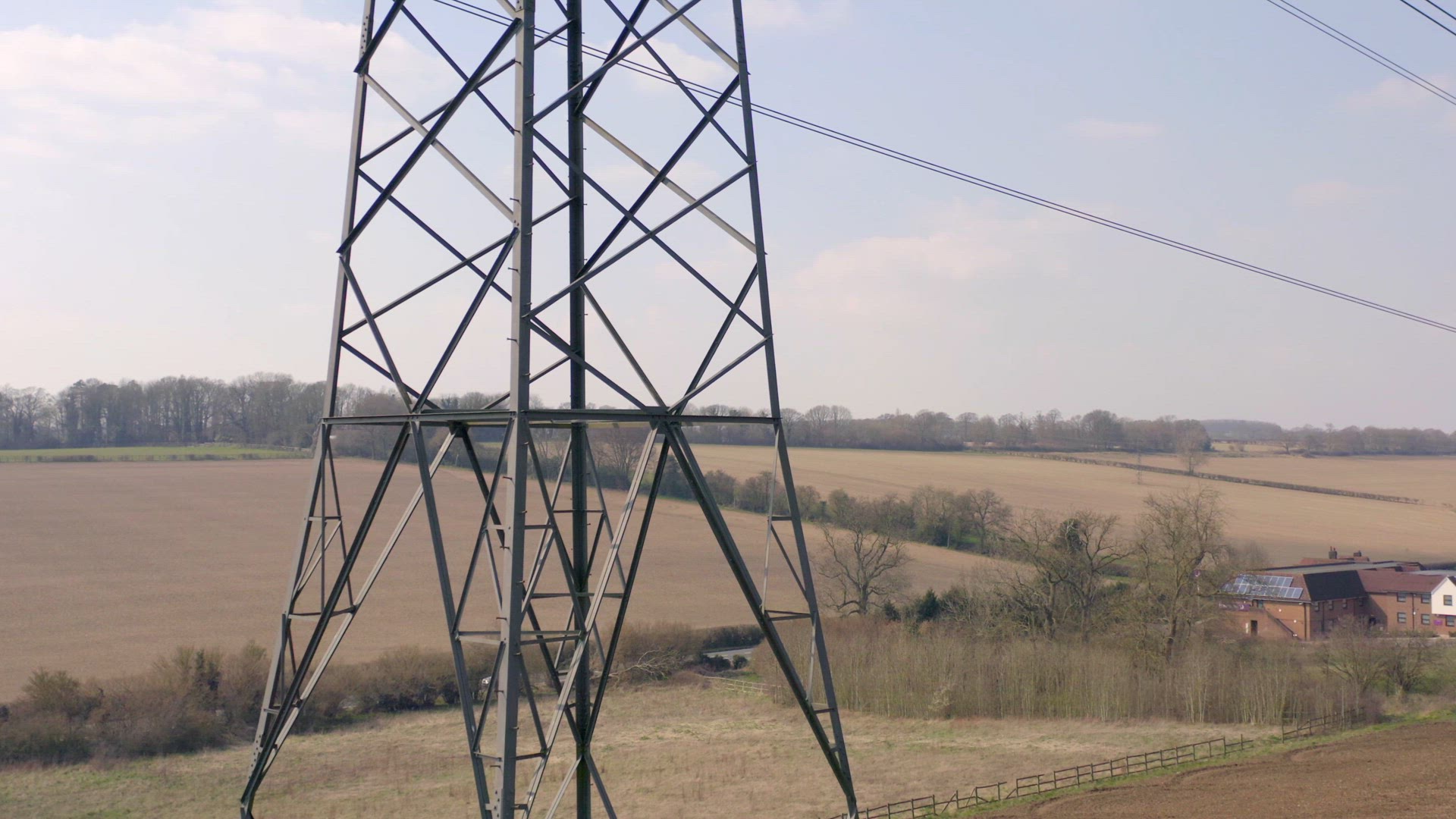 High Voltage Electrical Transmission Pylon Close Up Aerial View