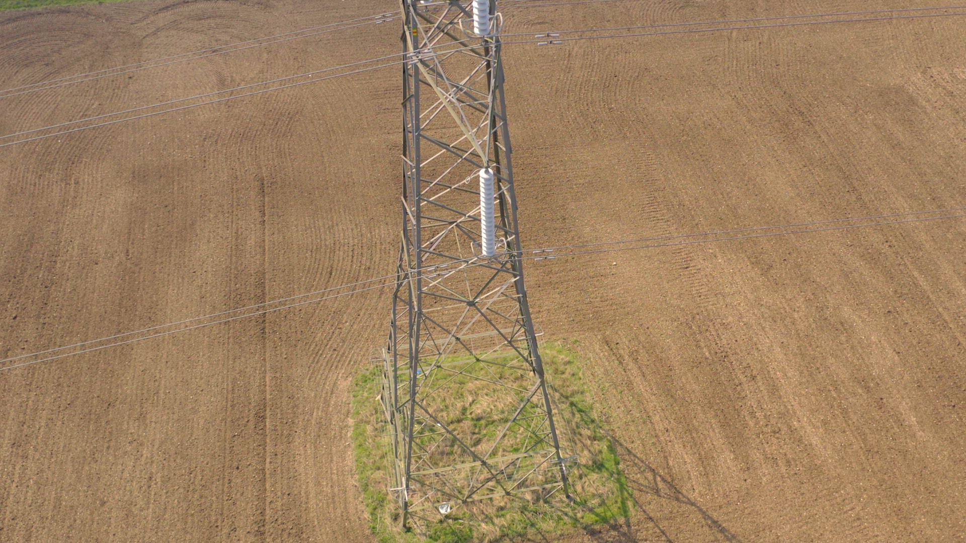 High Voltage Electrical Pylon Close Up Aerial View