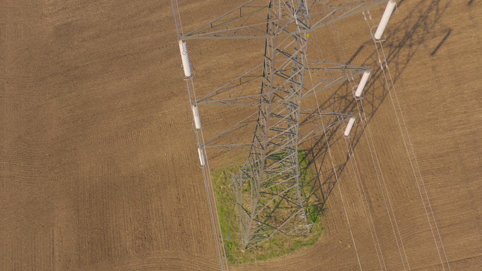 High Voltage Electrical Pylon Close Up Aerial View