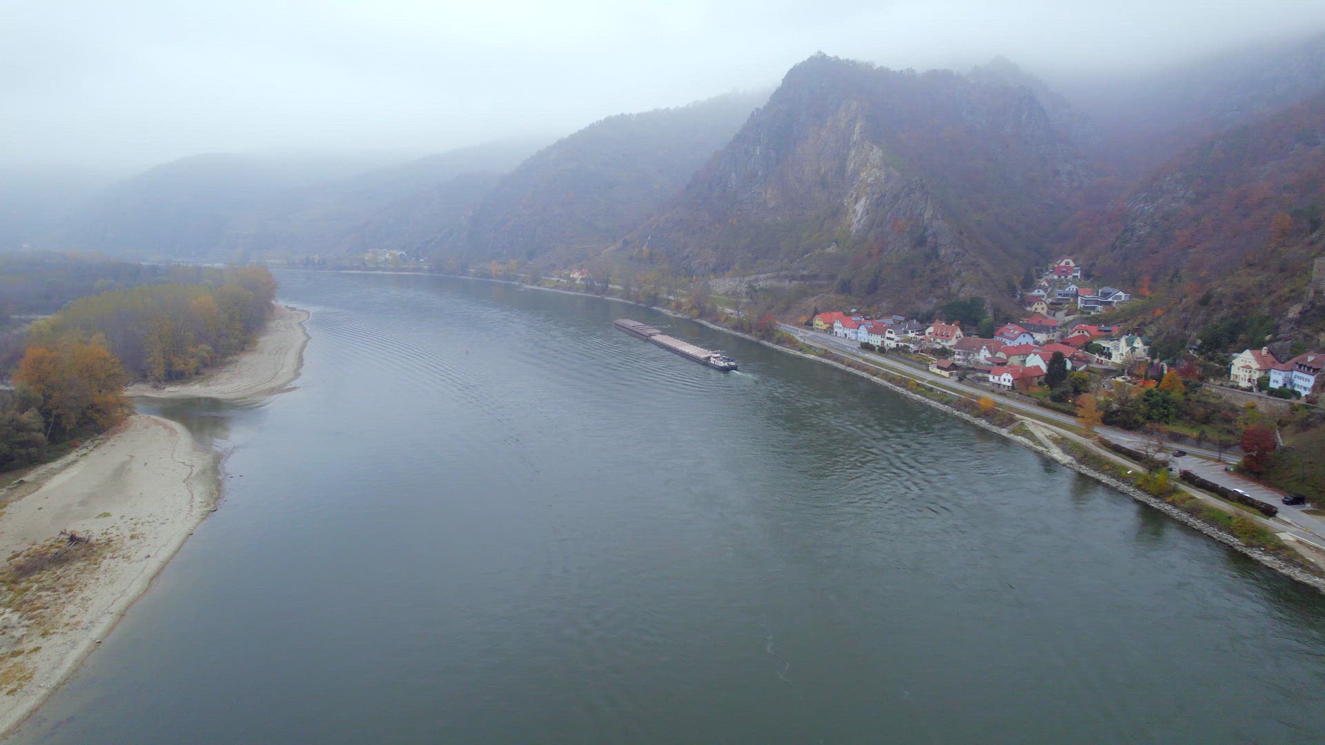 Cargo Pusher Boat on a Foggy Morning on the River Danube