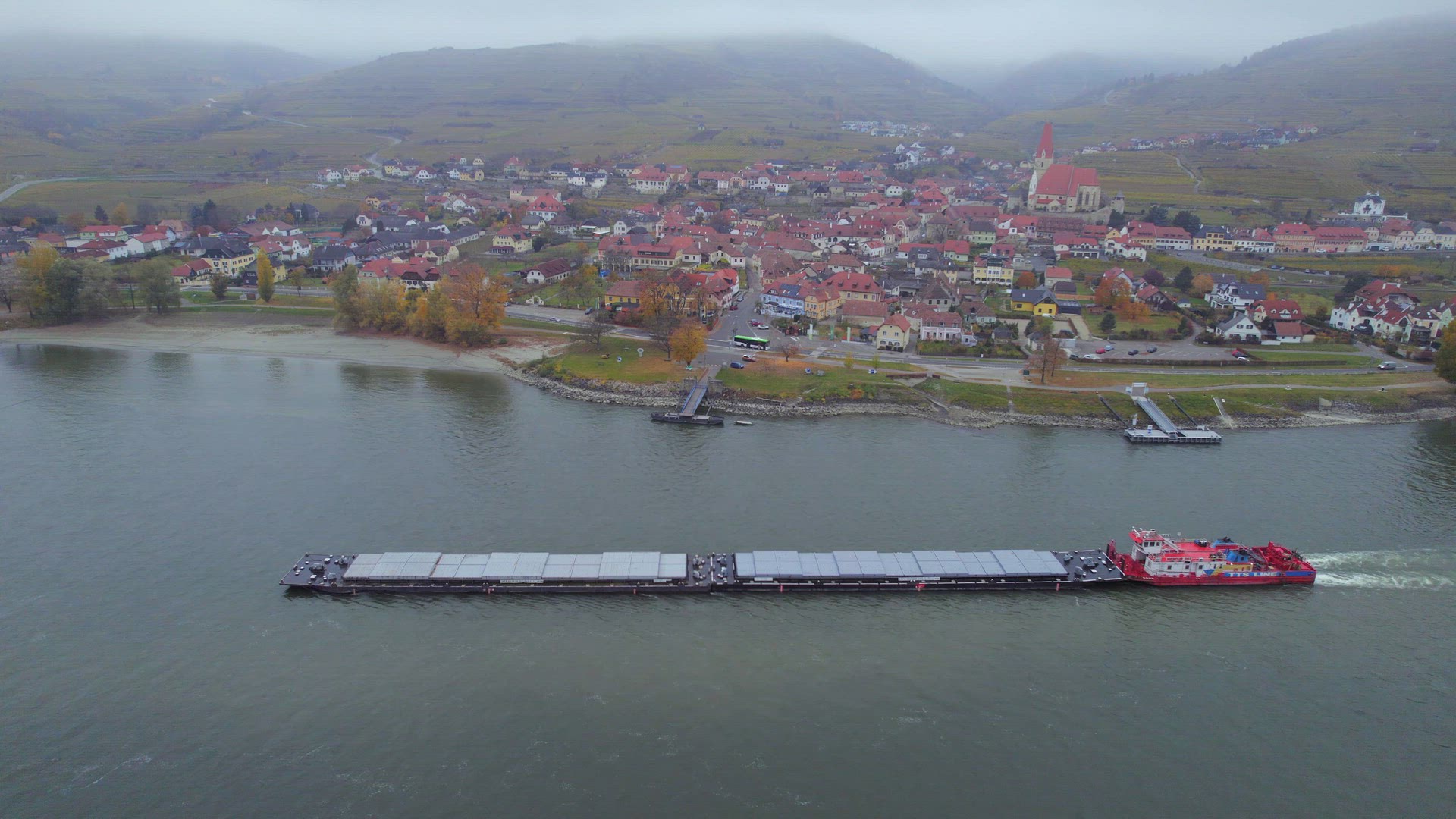 Cargo Pusher Boat on a River Transporting Cargo and Goods