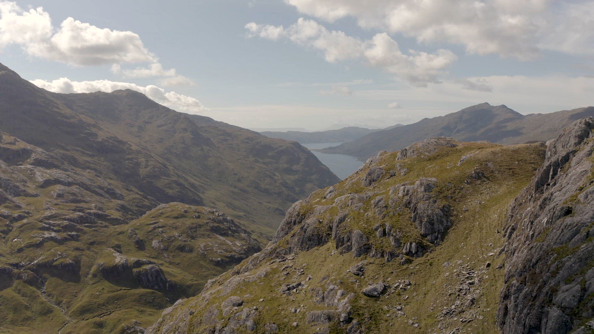 Beautiful Aerial Views Of The Scottish Highlands With A Loch In The Distance