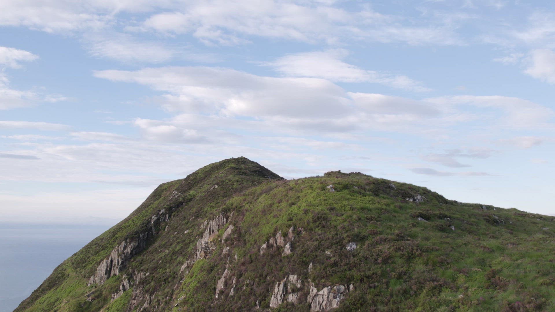 The Scottish Holy Isle with Mountainous and Coastal Landscape