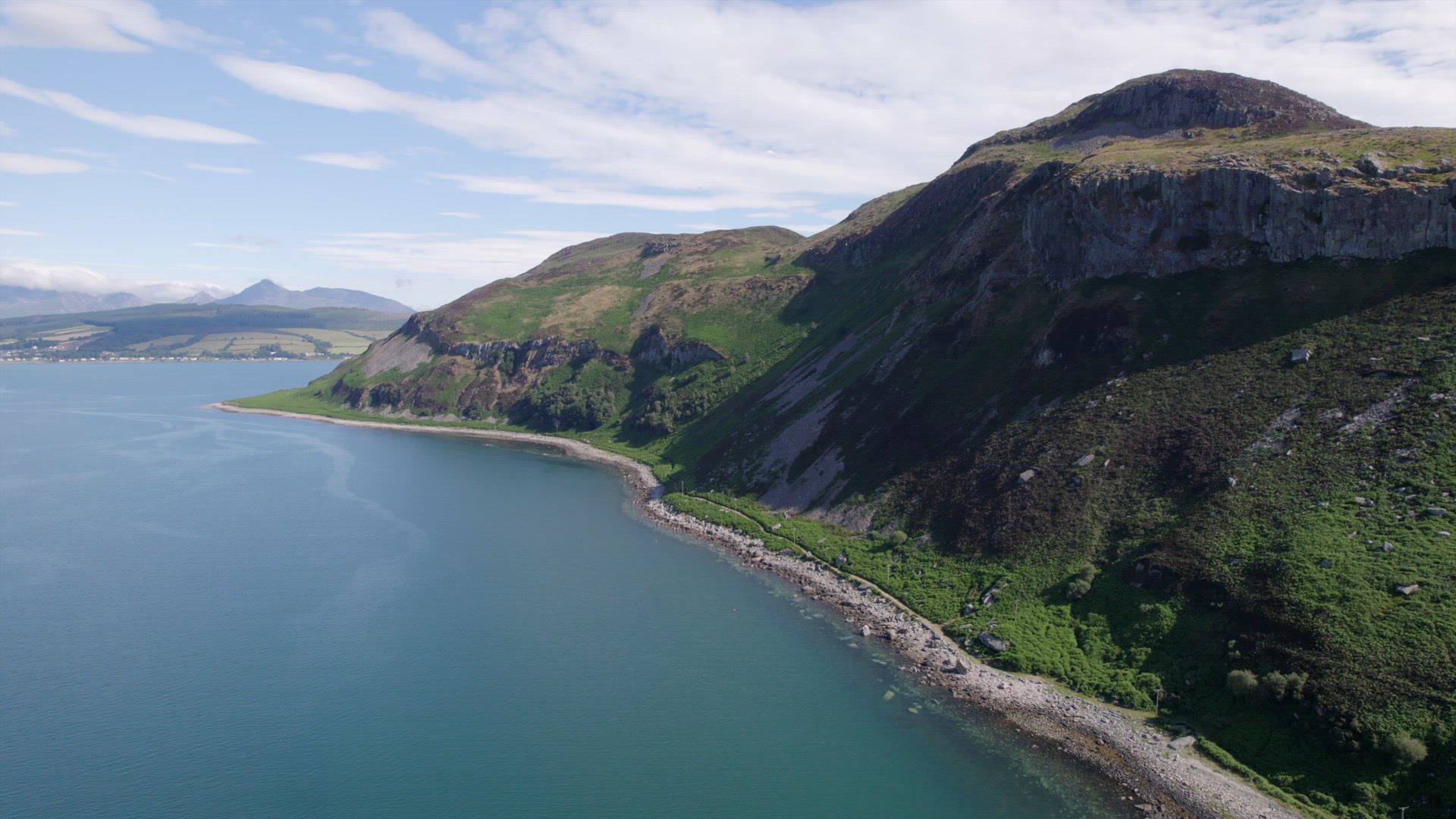 The Scottish Holy Isle with Mountainous and Coastal Landscape
