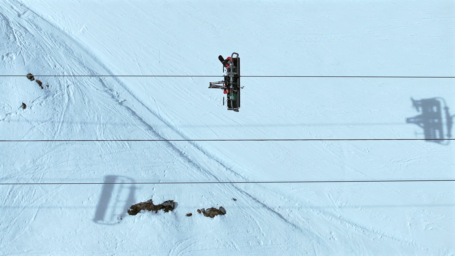 Bird's Eye Aerial View of a Ski Chairlift in a Resort