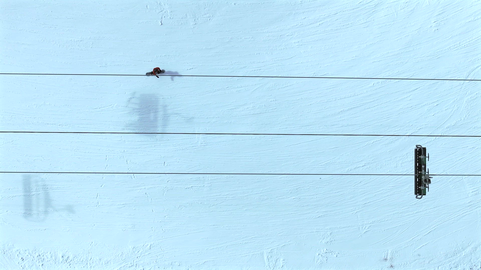Bird's Eye Aerial View of a Ski Chairlift in a Resort