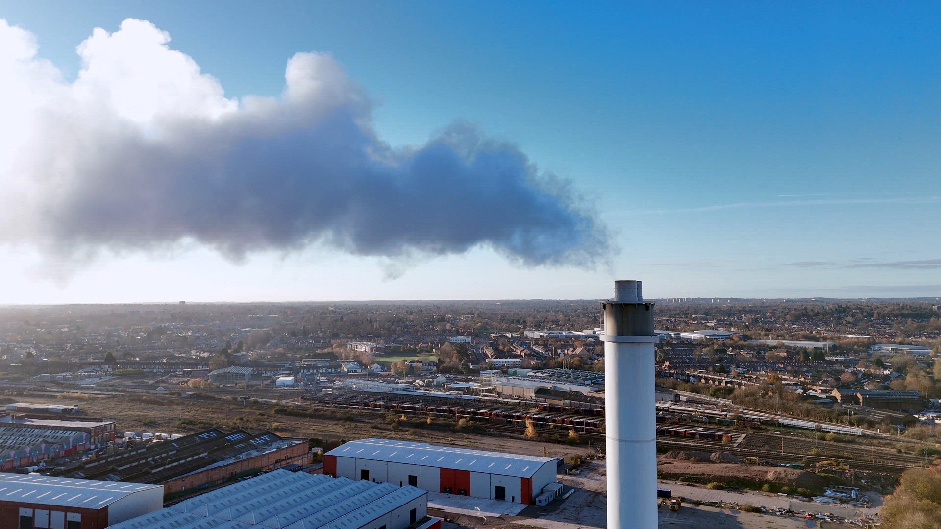 Smoke Bellows From an Industrial Chimney Contributing To Climate Change