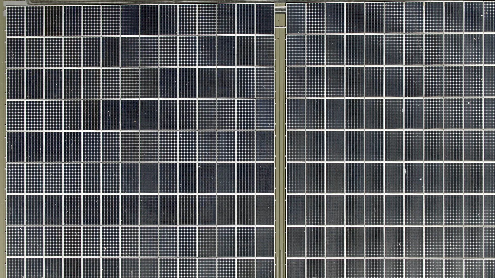 Aerial View of Solar Panels installed on a Roof
