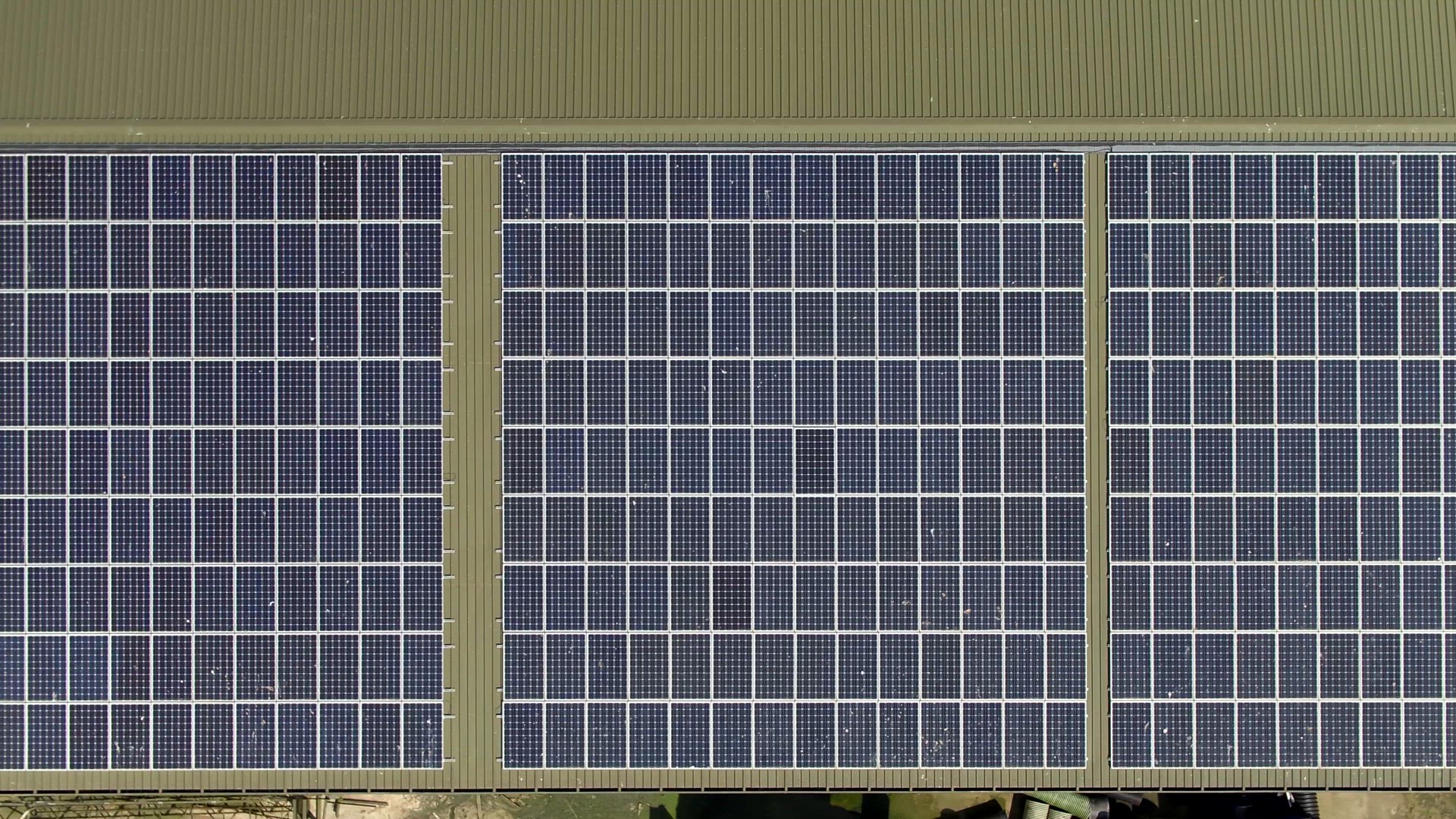 Aerial View of Solar Panels installed on a Commercial Roof