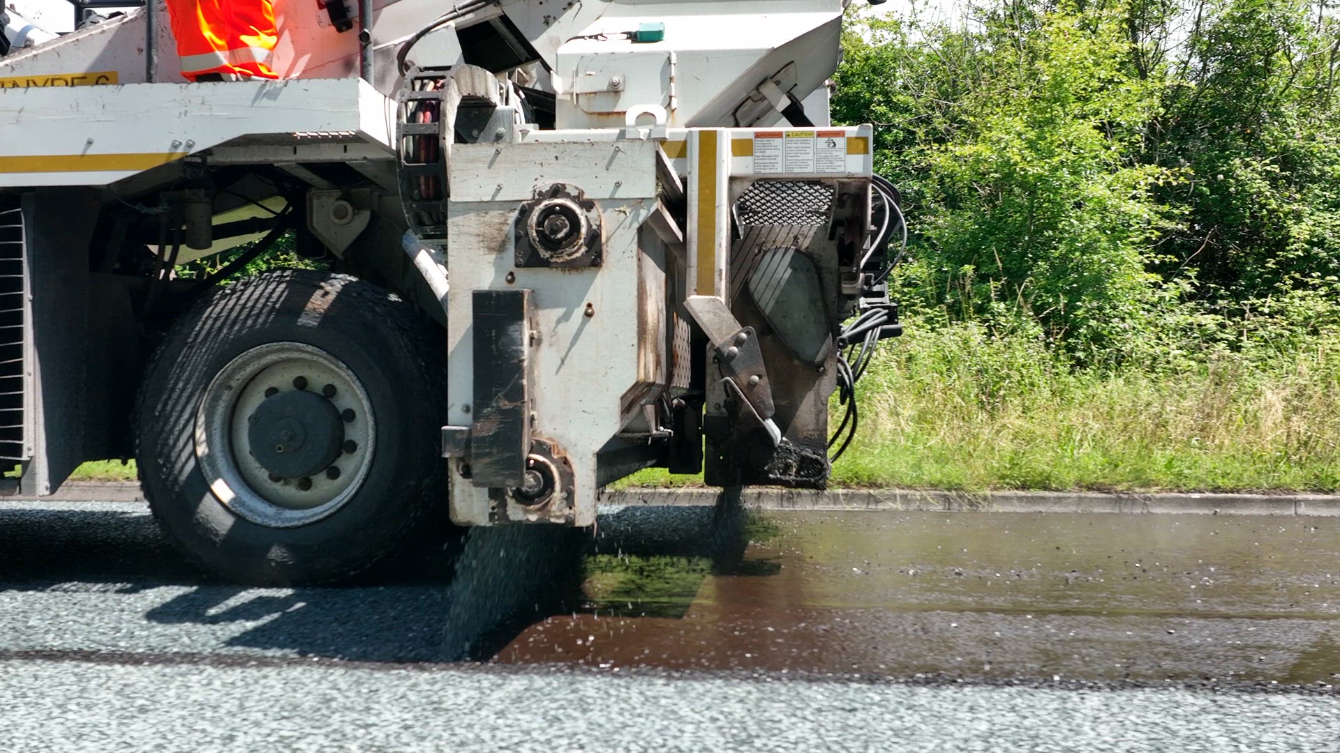 Road Resurfacing By Surface Dressing Process