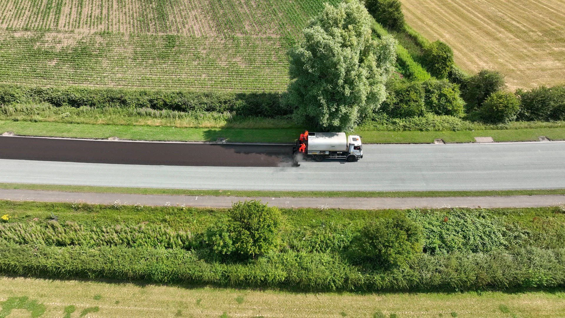 Road Resurfacing Aerial View of Surface Dressing Micro Asphalt Process