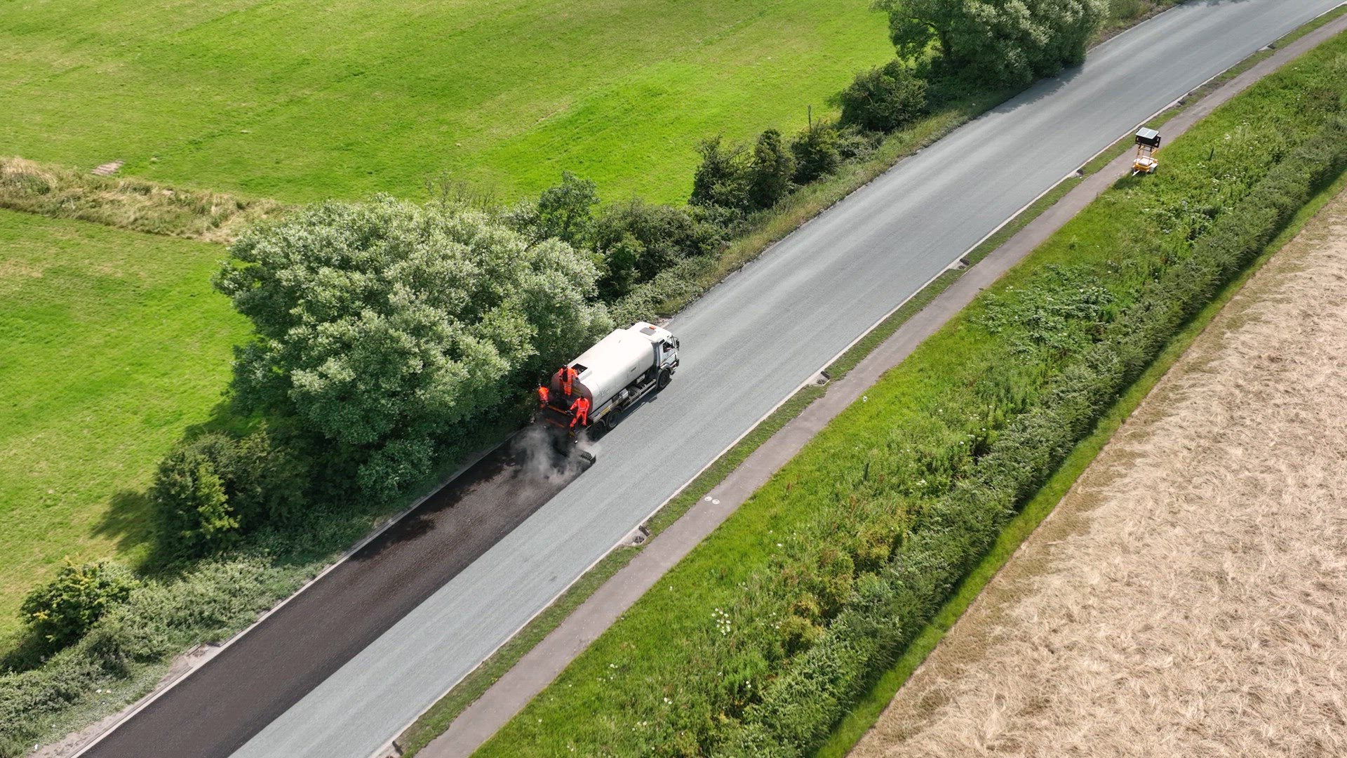 Road Resurfacing Aerial View of Surface Dressing Micro Asphalt Process