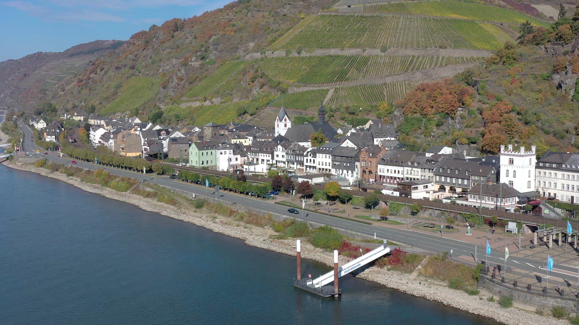 Commuter Train Passing Through a Small Town